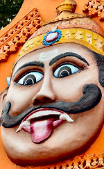 Face of a god on the face of a Hindu temple