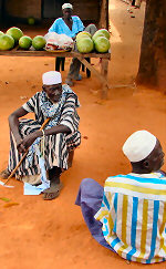 Men by the road in Gambia